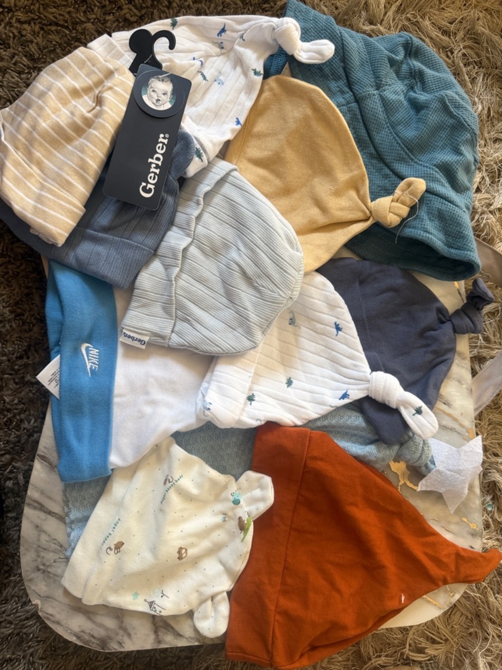 (12) Gerber Baby Knot Hats Set - Blue, White, Rust, Mustard, Teal